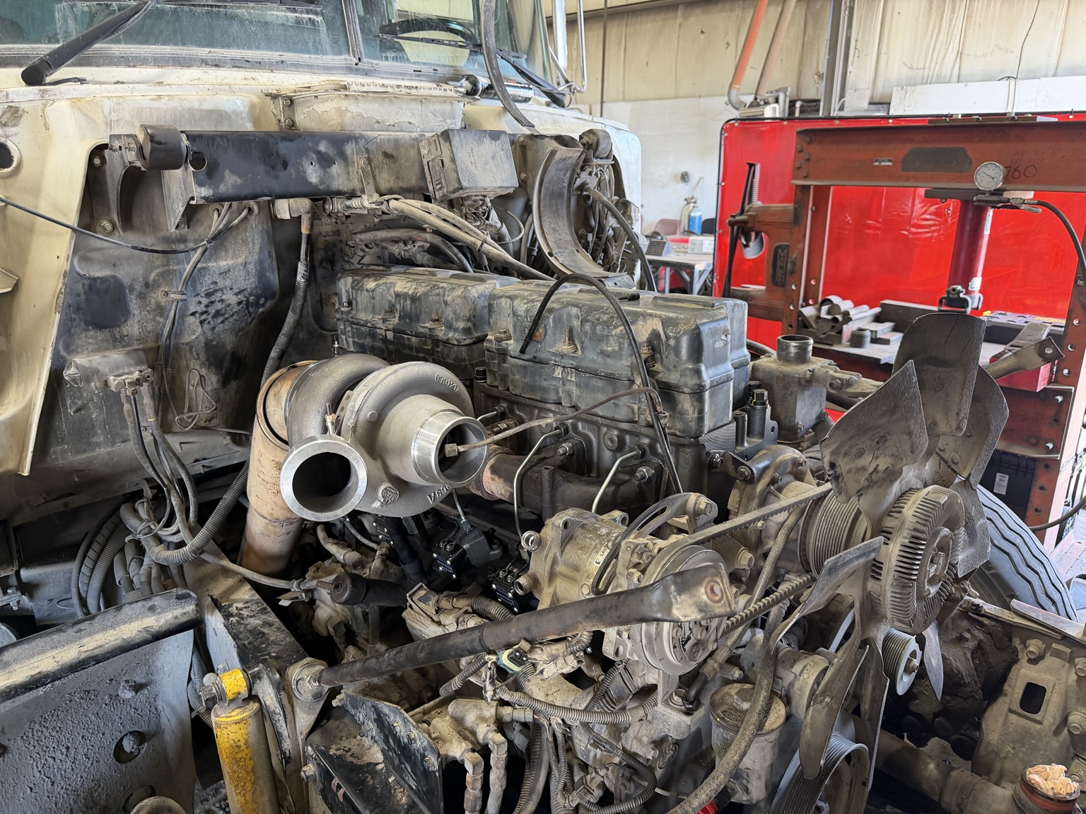 Diesel engine and turbocharger in a truck engine bay
